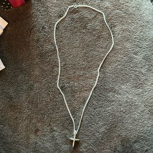 Sterling Silver 20” chain with cross.
